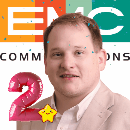 headshot of a man, number two mylar balloon, EMC Communications logo