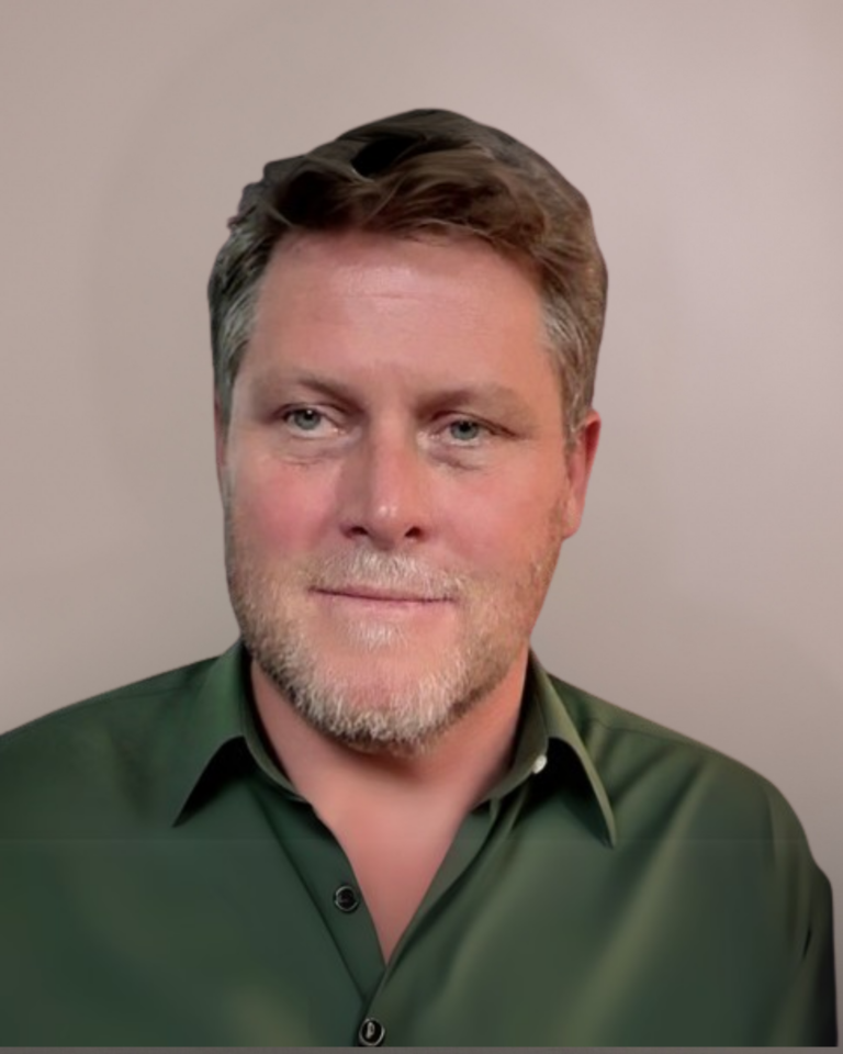 headshot of a man in a green shirt